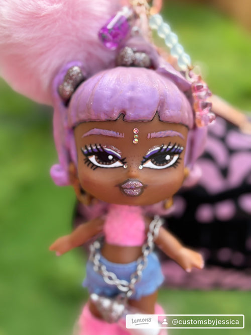 Custom hand painted and sculpted Brat doll keychain